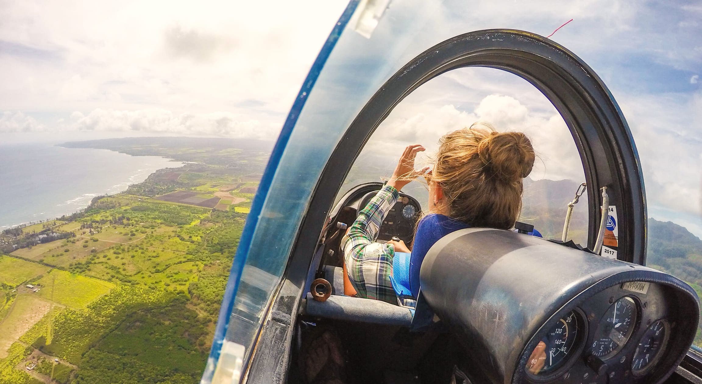 View from inside the glider looking out over the North Shore coast